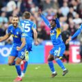 Leeds United players celebrate after qualifying for FA Cup semi-finals