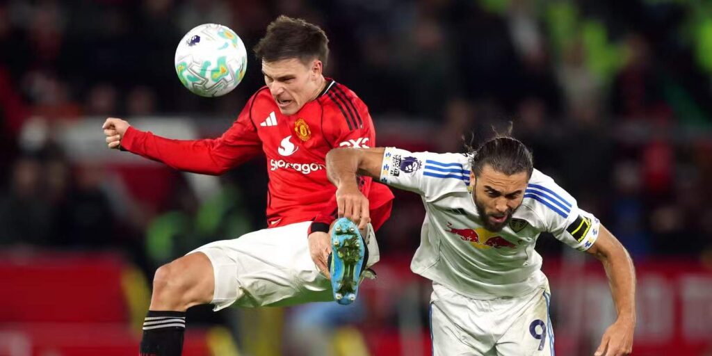 Manuel Ugarte and Dominic Calvert-Lewin in a battle for the ball