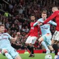 Benjamin Sesko shooting toward Brentford's goal