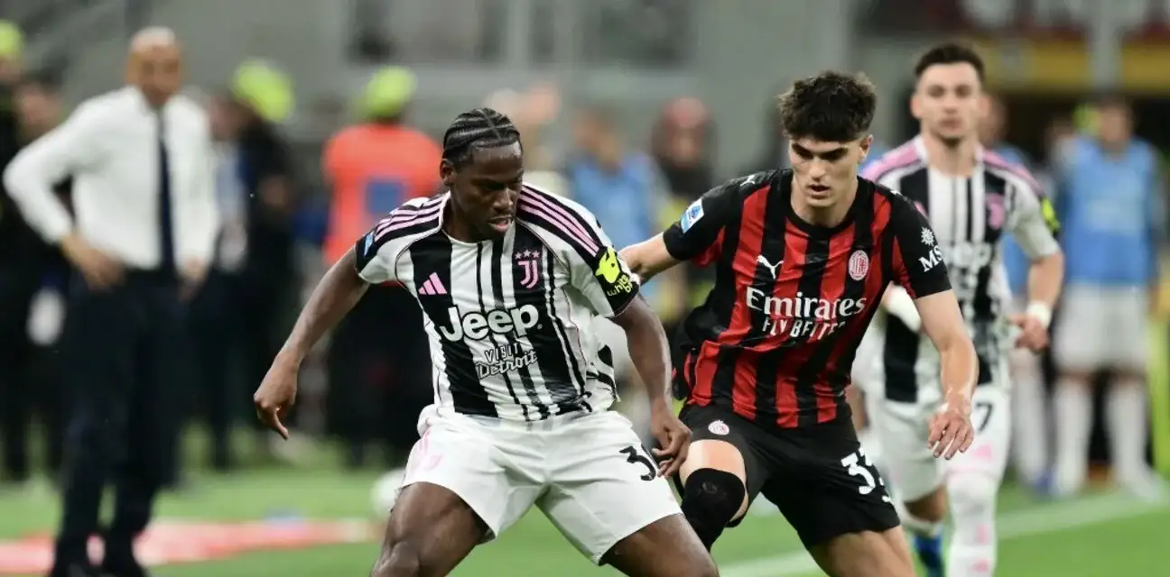 Juventus and Milan players in a battle for the ball