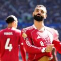 Mohamed Salah celebrates after scoring against Everton