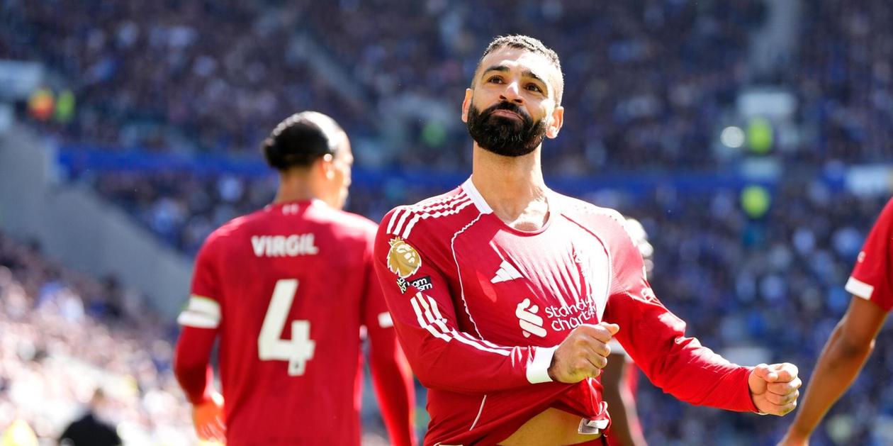 Mohamed Salah celebrates after scoring against Everton