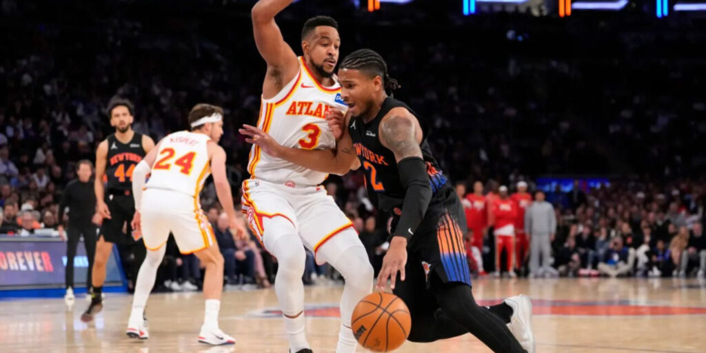 CJ McCollum trying to stop Josh Hart