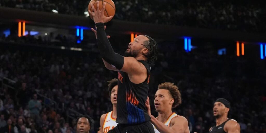 Jalen Brunson attacking Atlanta Hawks' basket