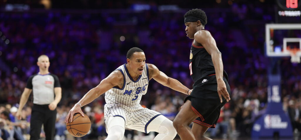 VJ Edgecombe watches as Desmond Bane dribbles the ball