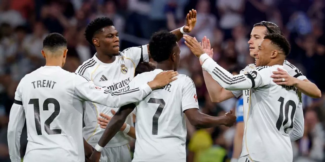 Real Madrid players congratulate Vinicius Jr after scoring against Alaves