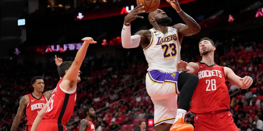 LeBron James attacking Houston Rockets' basket