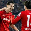 Freiburg players celebrate after scoring against Celta