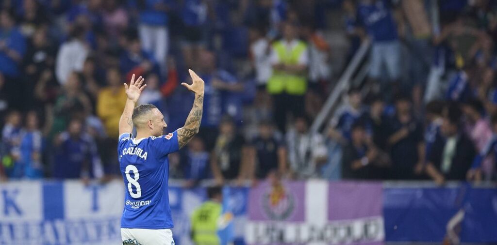 Santi Cazorla waving at the fans