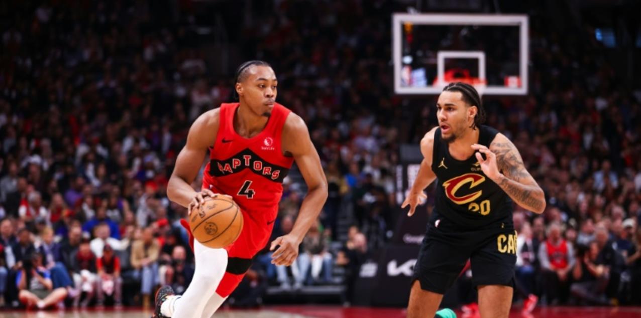 Scottie Barnes dribbles tha ball