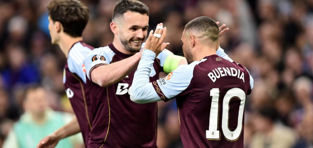 Aston Villa players congratulate one another after scoring against Nottingham Forest
