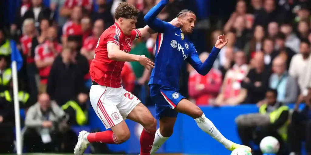 Chelsea and Nottingham Forest players in a battle for the ball