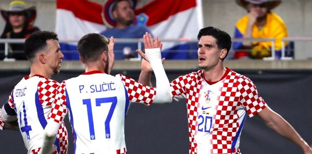 Croatia players celebrate after scoring a goal