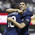 Achraf Hakimi and Ousmane Dembele hugging each other