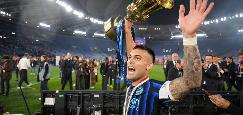 Lautaro Martinez lifting the Coppa Italia trophy