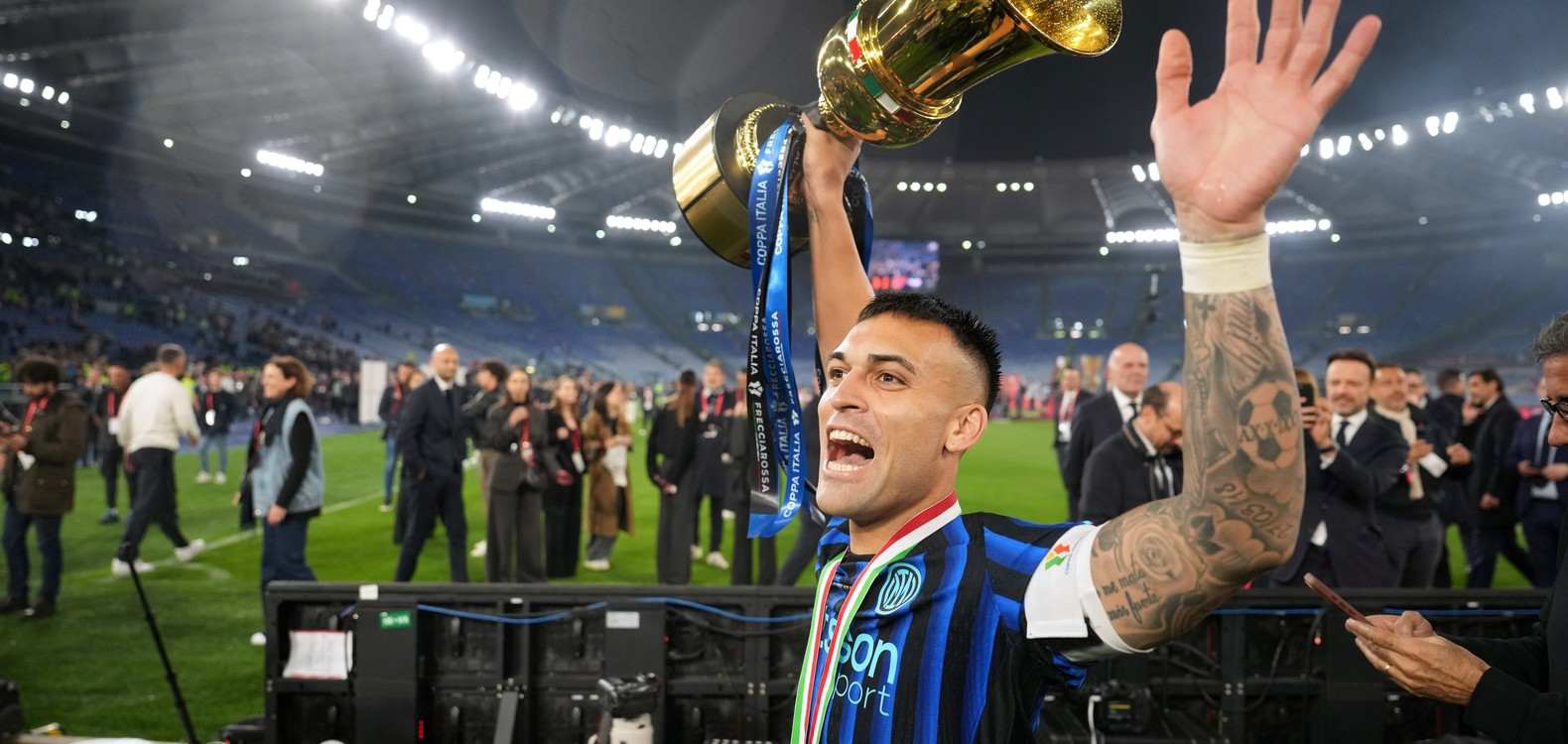 Lautaro Martinez lifting the Coppa Italia trophy
