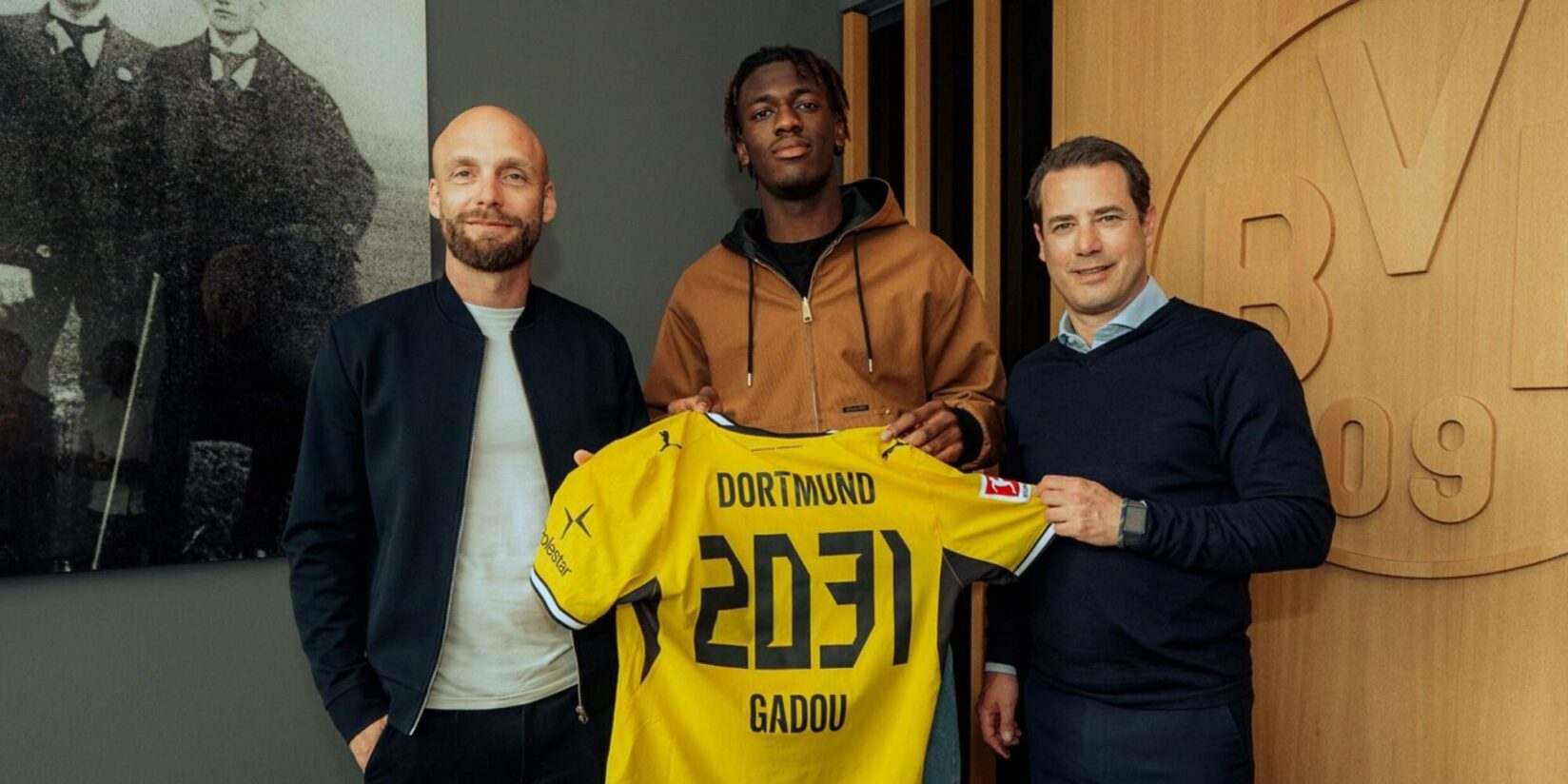 Joane Gadou posing with Borussia Dortmund shirt