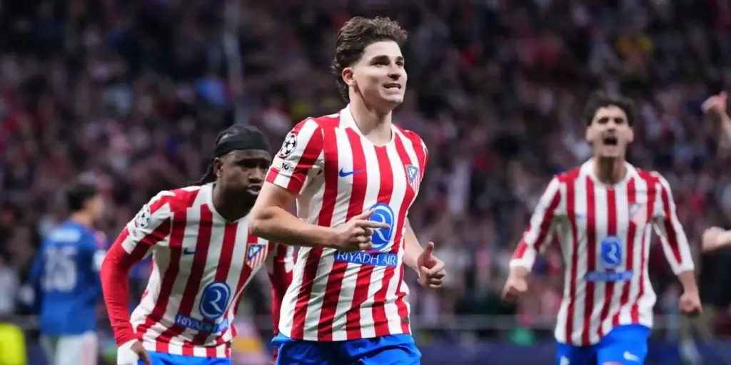 Julian Alvarez celebrates after scoring a goal