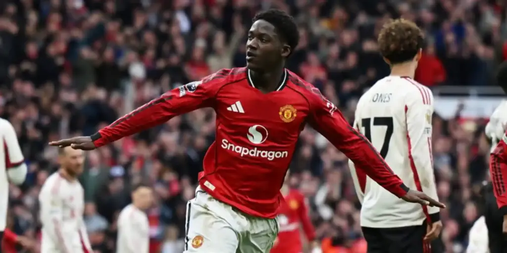 Kobbie Mainoo celebrates after scoring against Liverpool