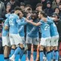 Manchester City players celebrate after scoring against Crystal Palace