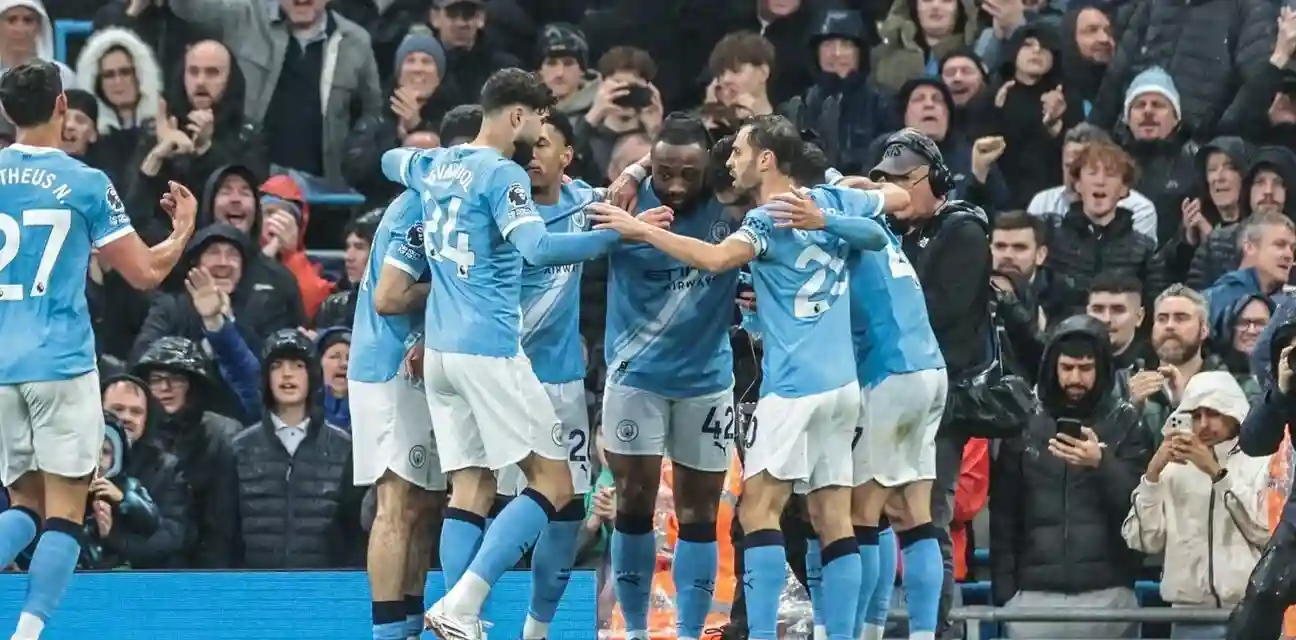 Manchester City players celebrate after scoring against Crystal Palace
