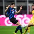 Milan and Atalanta players in a battle for the ball