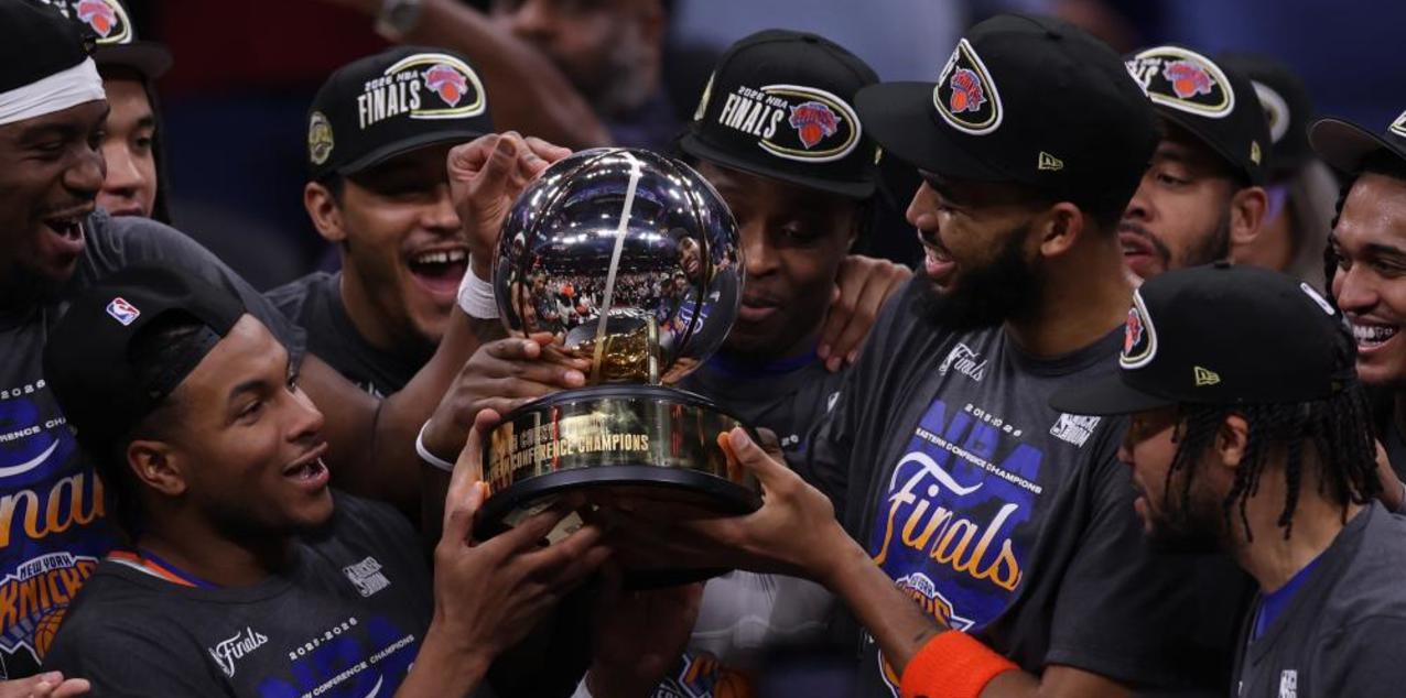 New York Knicks players celebrate after reaching the NBA Finals