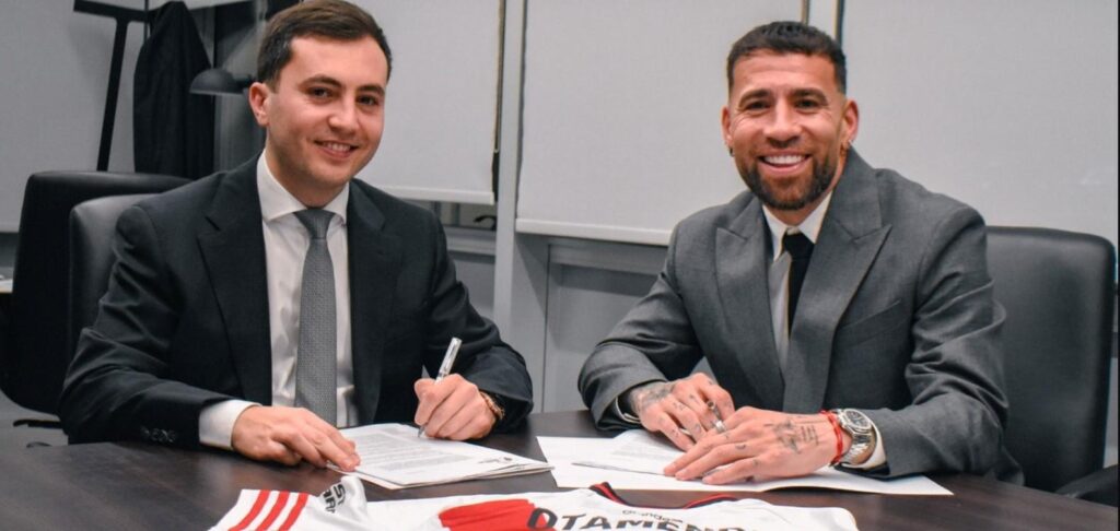 Nicolas Otamendi signing his River Plate contract