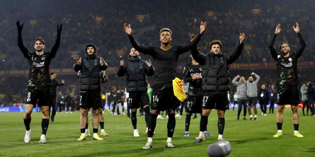 PSG players congratulate their supporters after securing the Ligue 1 title