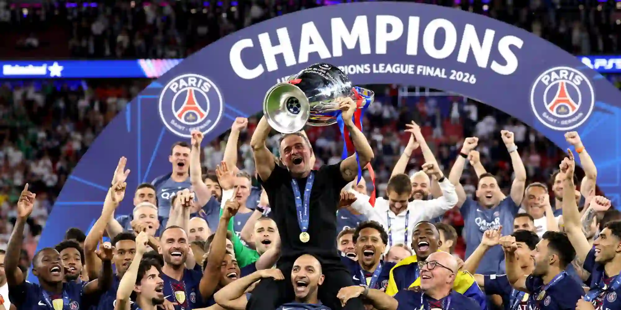 Paris Saint-Germain players and staff celebrate after winning the 2025/26 Champions League trophy
