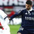 Pierre Lees-Melou trying to stop Ousmane Dembele