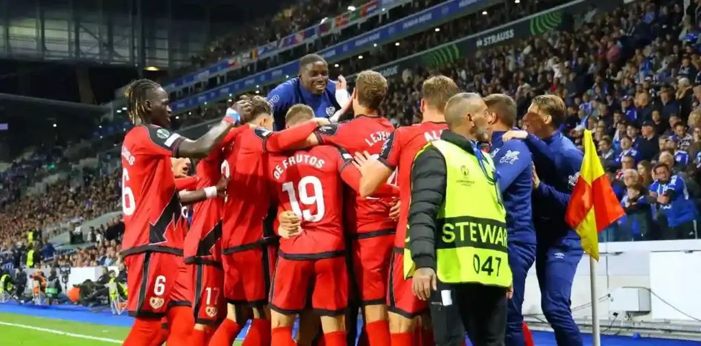 Rayo Vallecano players celebrate after scoring against Strasbourg