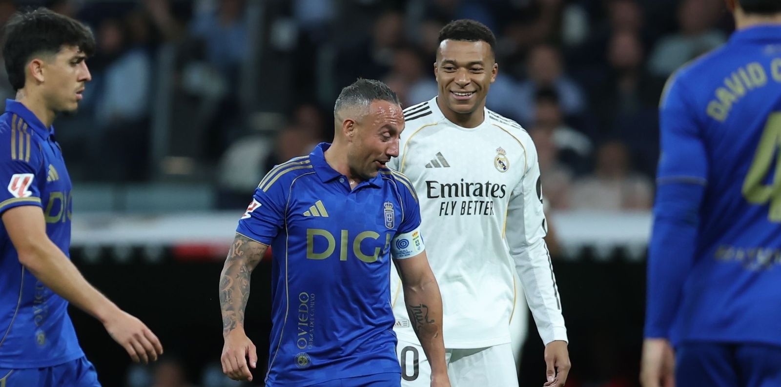 Kylian Mbappe and Santi Cazorla during the match between Real Madrid and Oviedo