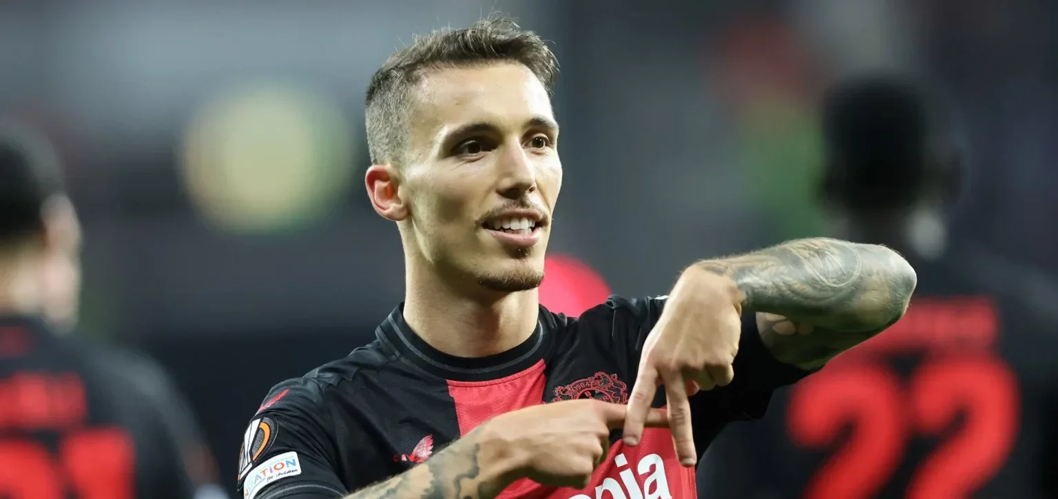 Alejandro Grimaldo celebrates after scoring for Bayer Leverkusen