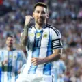 Lionel Messi celebrates after scoring a penalty in a friendly against Iceland