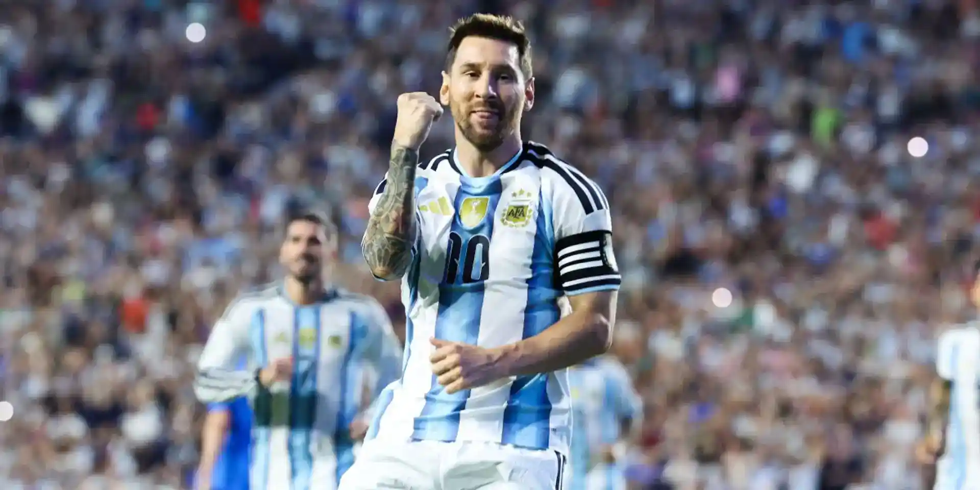 Lionel Messi celebrates after scoring a penalty in a friendly against Iceland