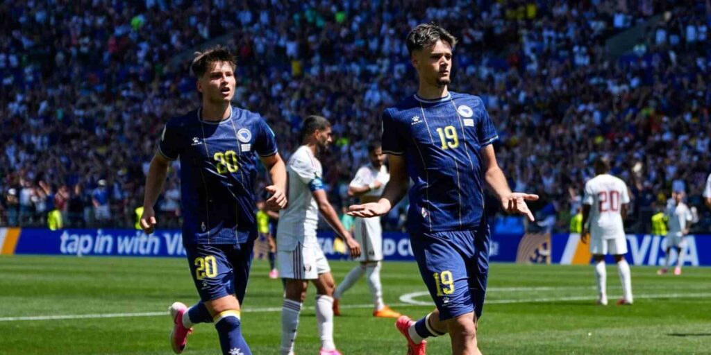 Bosnia & Herzegovina players celebrate after scoring against Qatar