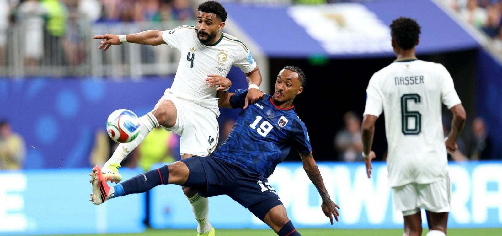 Saudi Arabia and Cape Verde players in a battle for the ball