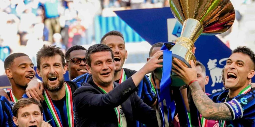 Inter head coach Cristian Chivu celebrates the Serie A title with his players