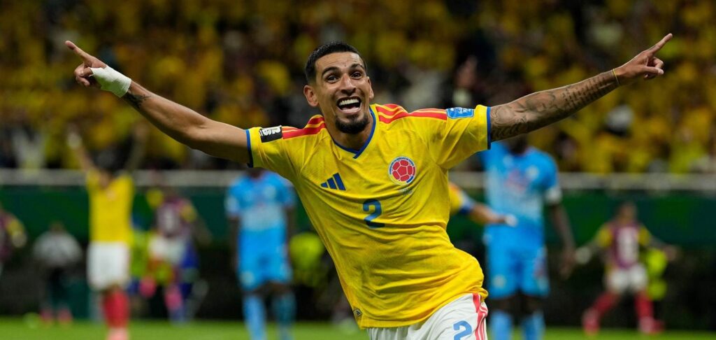 Daniel Munoz celebrates after scoring against DR Congo