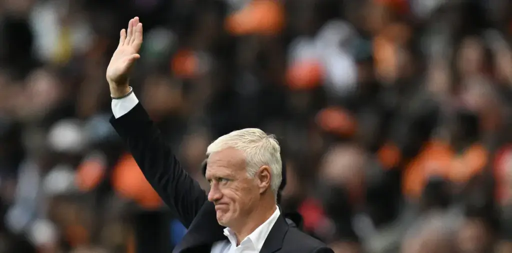 France head coach Didier Deschamps waving to supporters