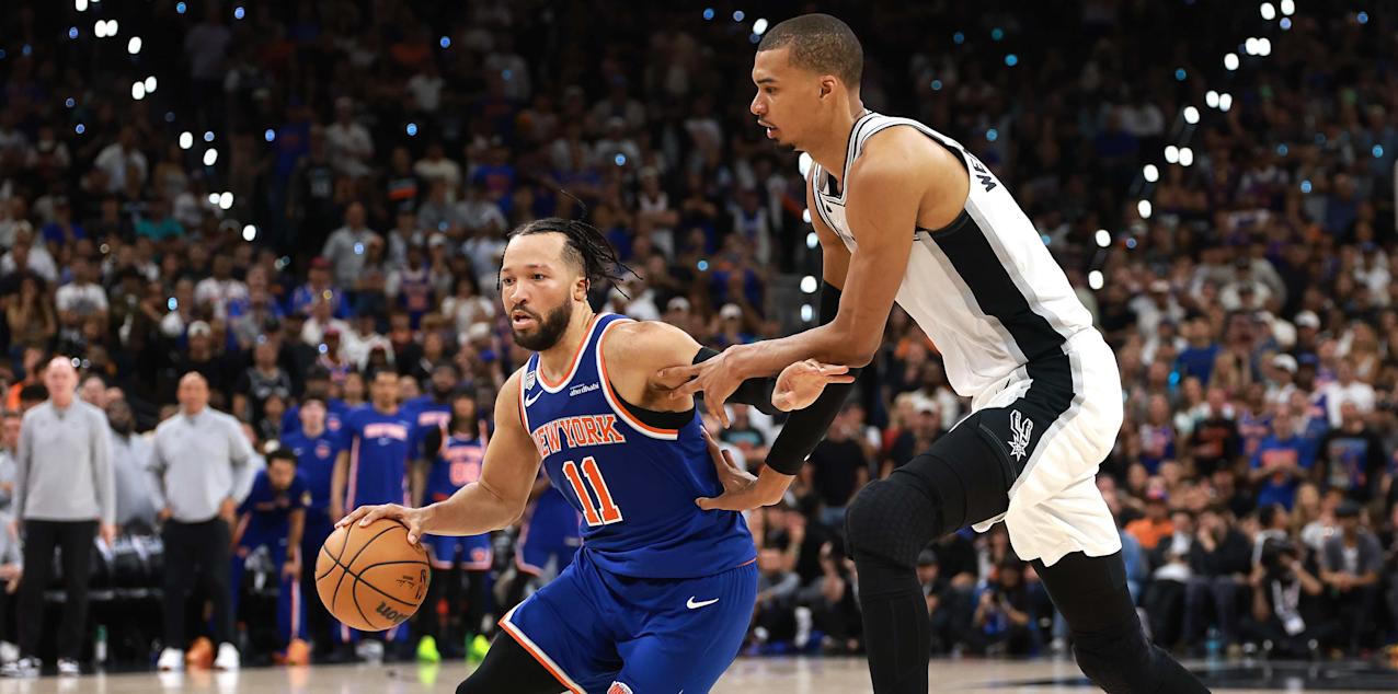 Jalen Brunson dribbling around Victor Wembanyama in Game 5 of NBA Finals