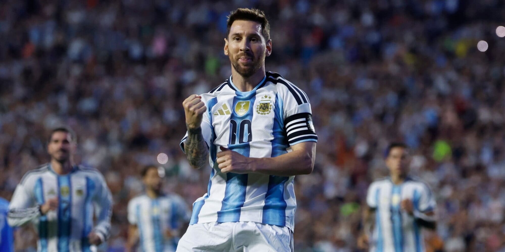Lionel Messi celebrates after scoring against Algeria