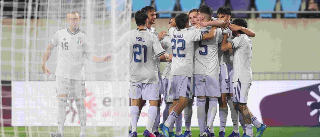 Italy players celebrate after scoring against Luxembourg