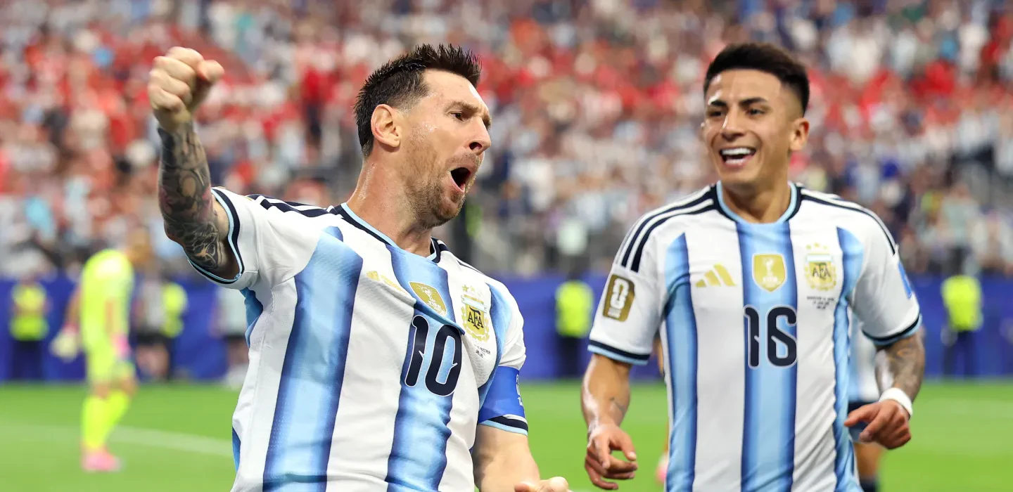 Leo Messi punches the air after scoring against Austria