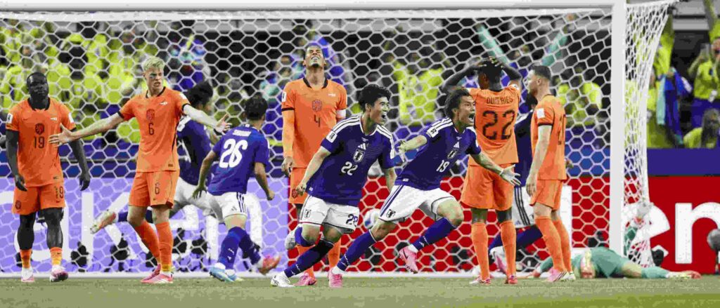 Japan players have just scored against the Netherlands