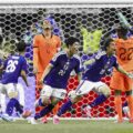 Japan players have just scored against the Netherlands
