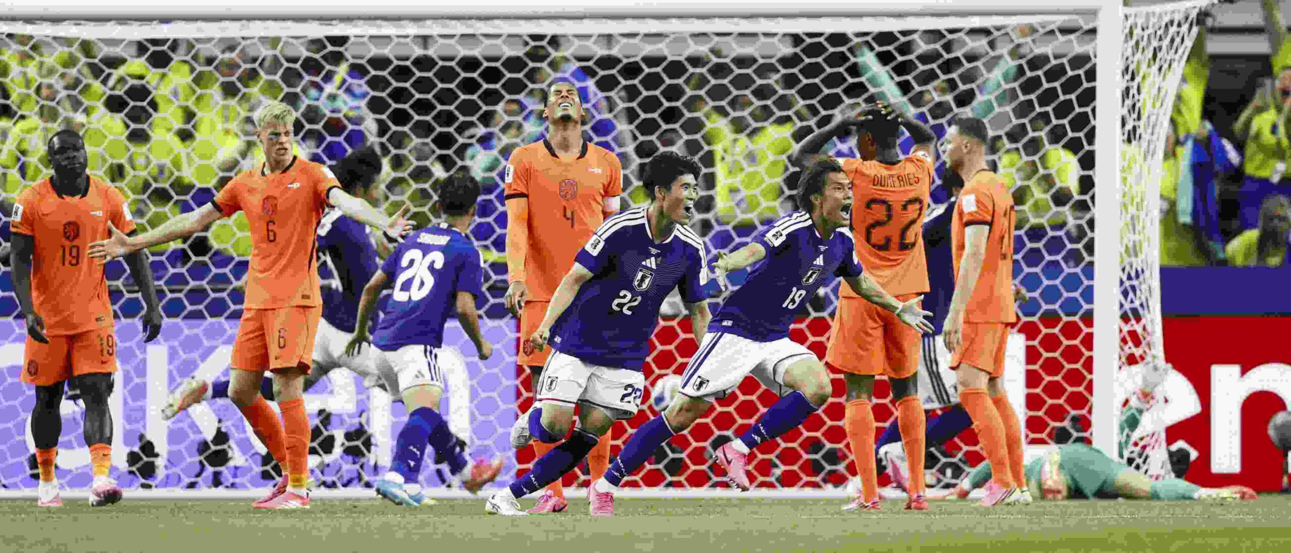 Japan players have just scored against the Netherlands