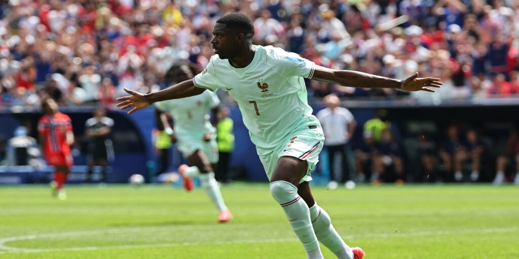 Ousmane Dembele celebrates after scoring against Norway