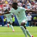 Ousmane Dembele celebrates after scoring against Norway